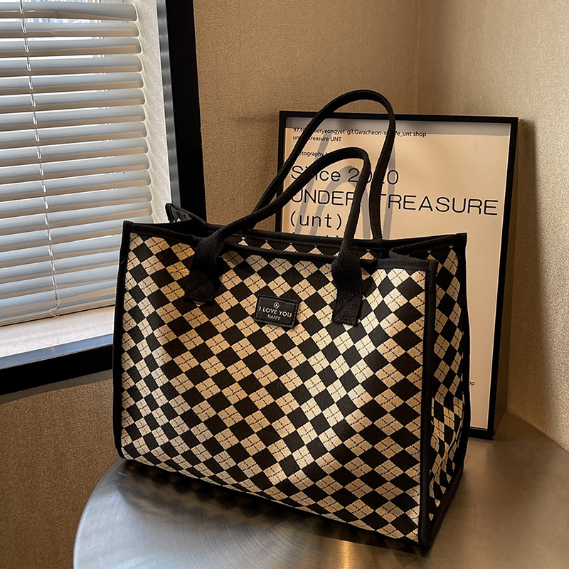 菱格手提购物袋帆布包女2023新大容量轻便旅行包男托特包健身包潮