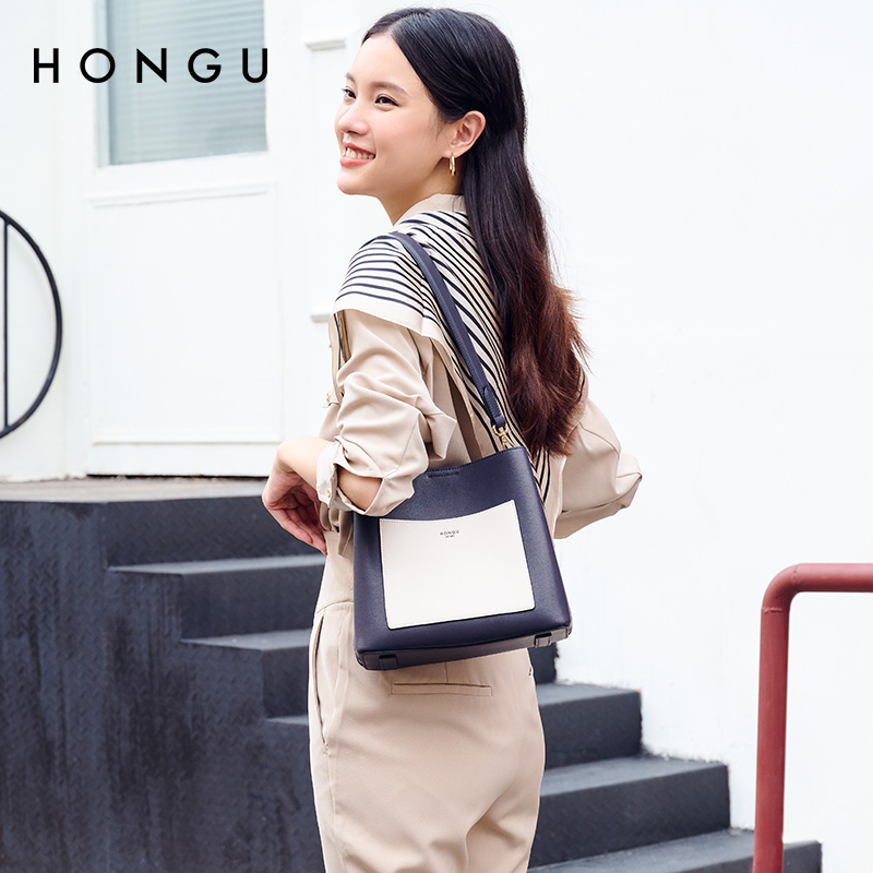 HONGU/红谷新款牛皮单肩撞色水桶包简约时尚女士肩包气质通勤女包